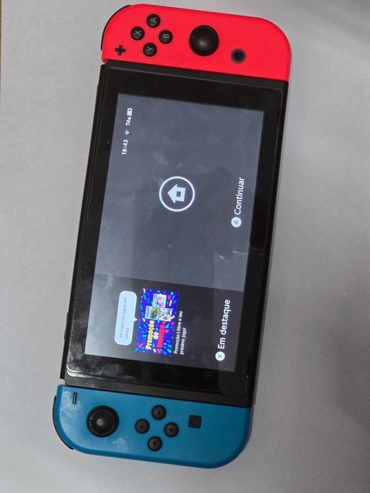 Nintendo Switch + acessórios e jogos (ver descrição)