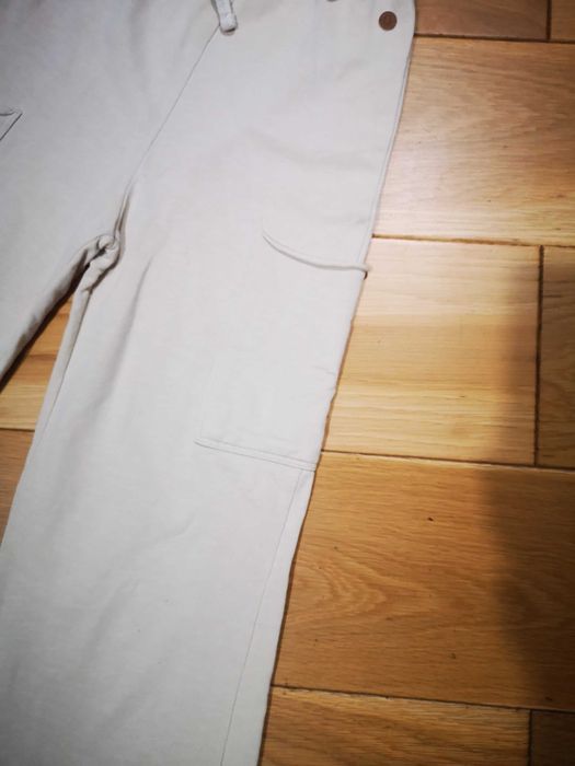 Ü by KappAhl kremowe spodnie dresowe 3/4 134/140 cm 12-13 lat