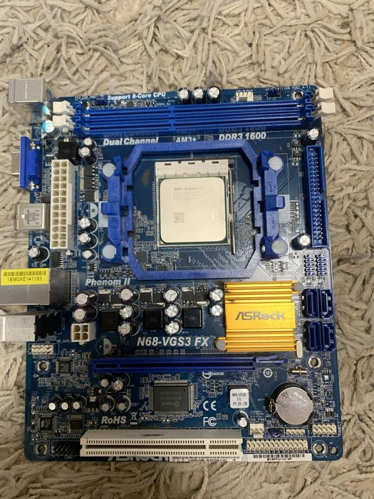 Продам материнку Asus n68vgs3fx с процессором AMD Atlon2 подарок