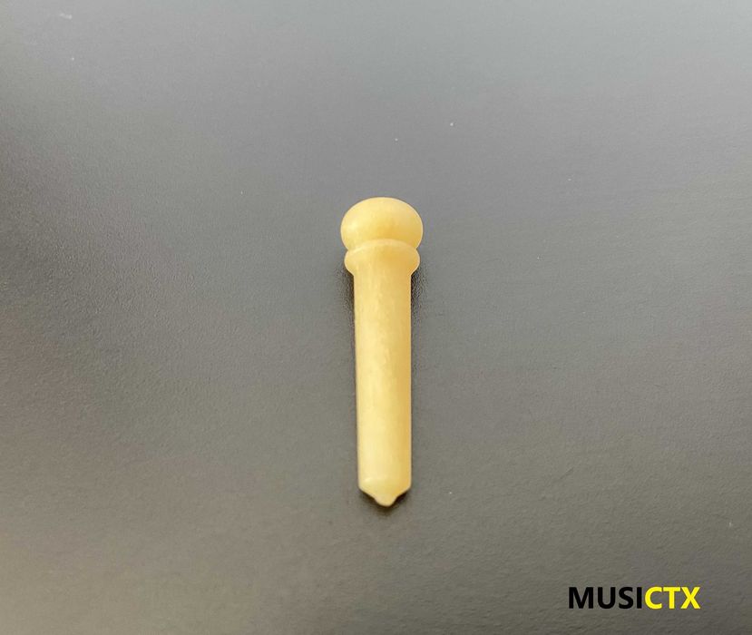 Pins em osso para guitarra folk