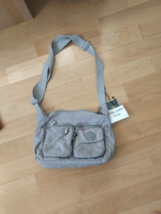 Torebka damska dużo kieszonek mieści A4