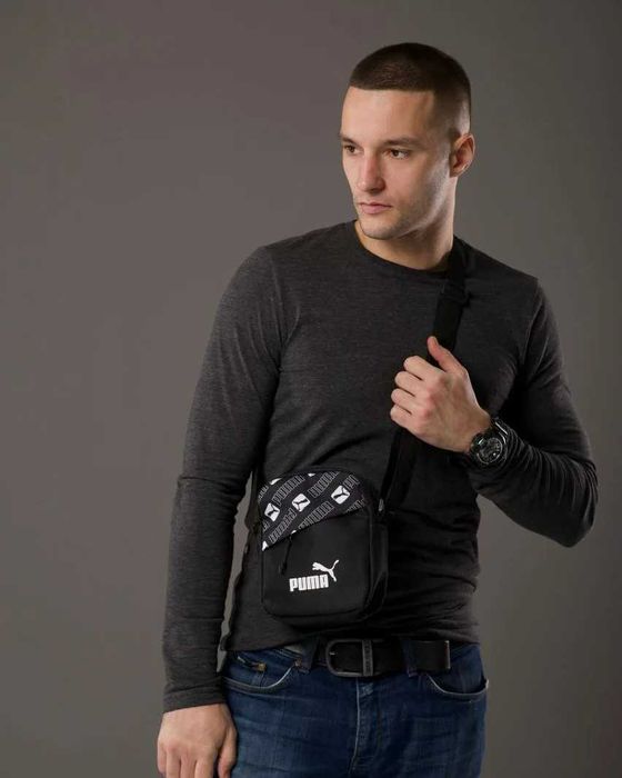 Чоловічі спортивні сумки та барсетки