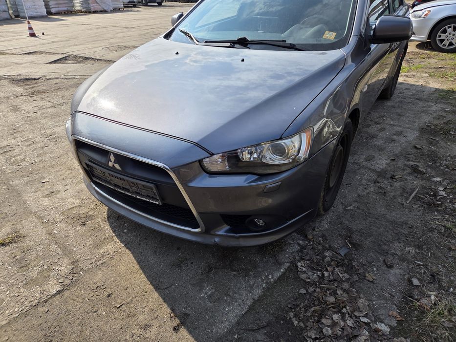 Lewa lampa xenon reflektor lewy Mitsubishi Lancer VIII IX