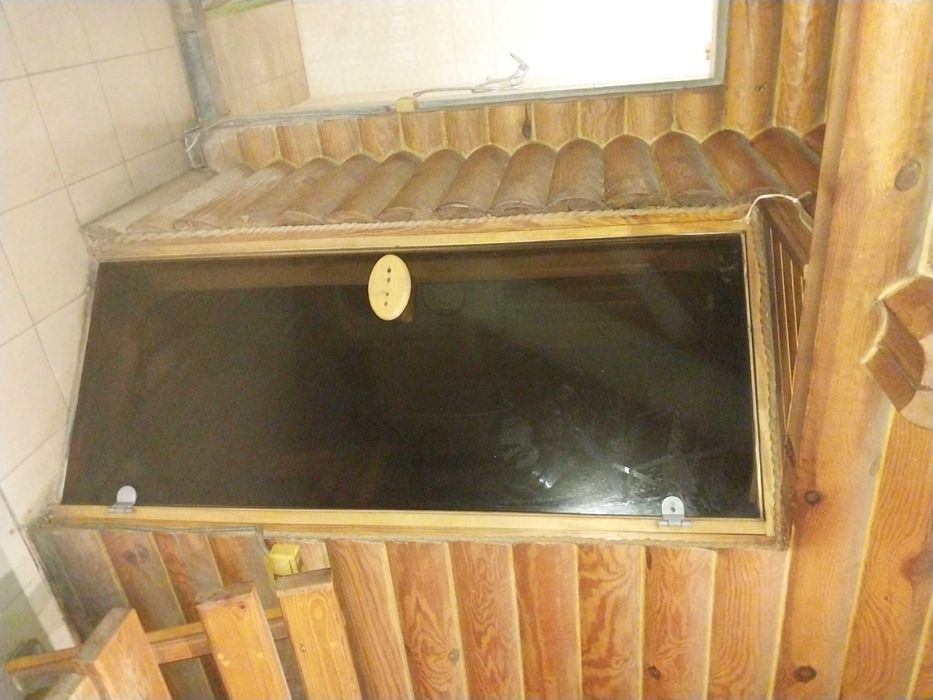 Дерев'яна баня зі зрубу розміром 5,6 м * 5,6 м