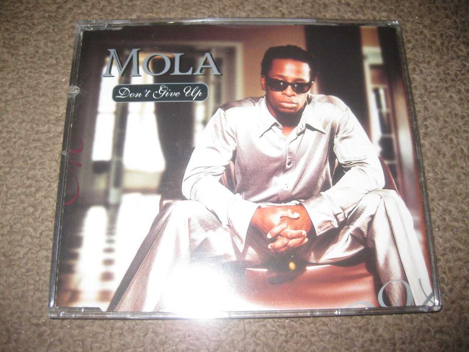 Mola's CD Single "Don't Give Up"64285983386114120