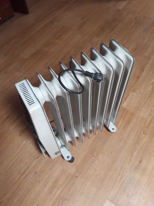 Aquecedores eletricos a oleo  em perfeito estado de funcionamento