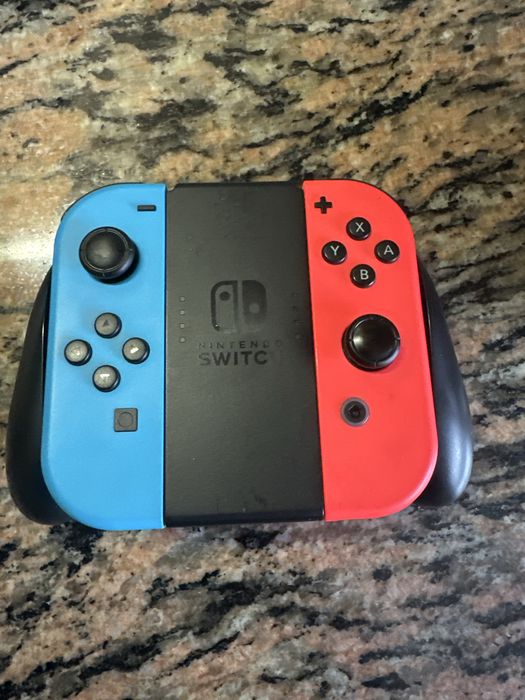 Nitendo switch ( com jogo , com carregador , cabo HDMI , comando , e mala para transportar a nitendo
