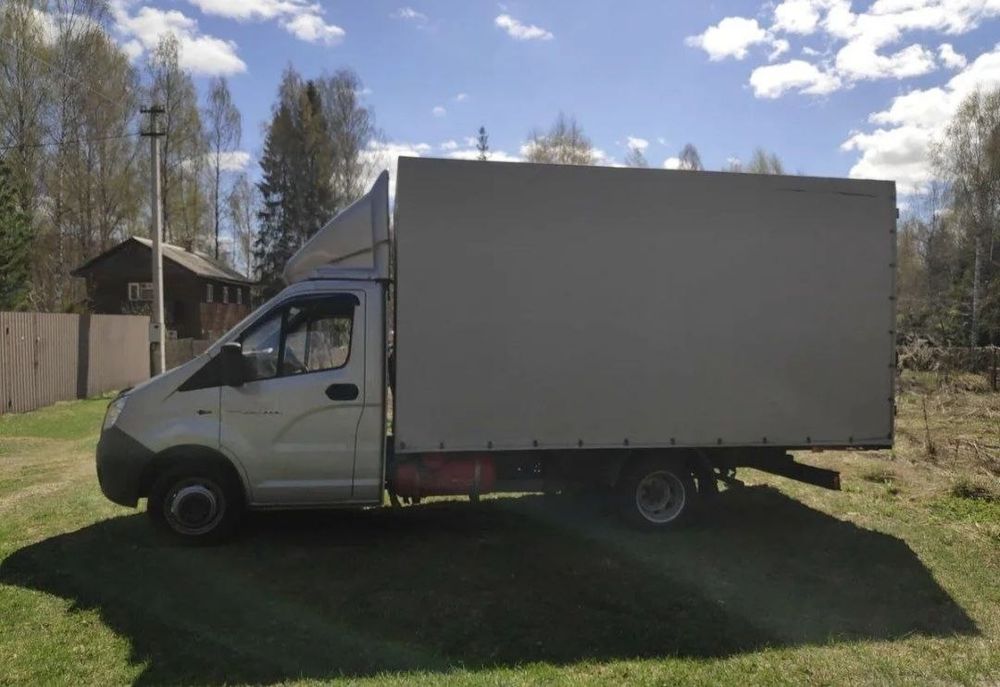 Грузовое такси по Киеву всей Украине Переезды грузчики перевозки квартирные мебели недорого грузовые перевозки газель