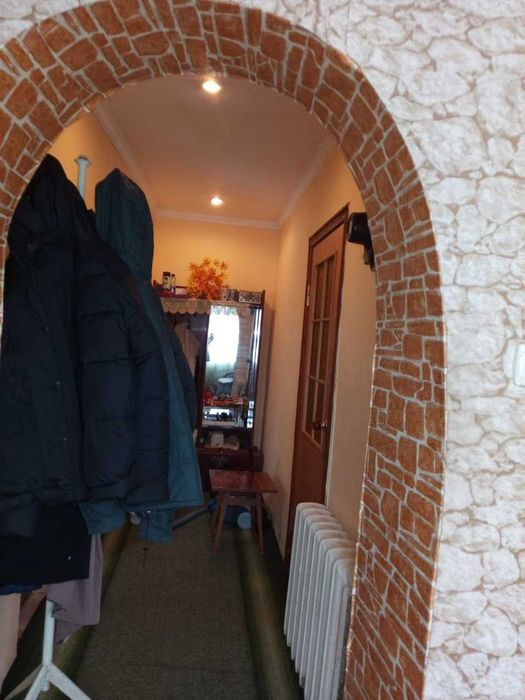 житловий будинок з господарськими будівлями