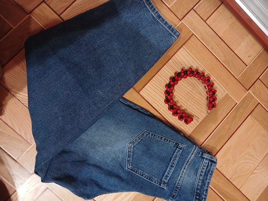 Джинси труби синього кольору