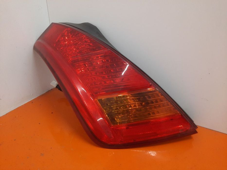 NISSAN MURANO I Z50 03-08 LAMPA LEWY TYŁ LEWA TYLNA ZEWNĘTRZNA 22063779