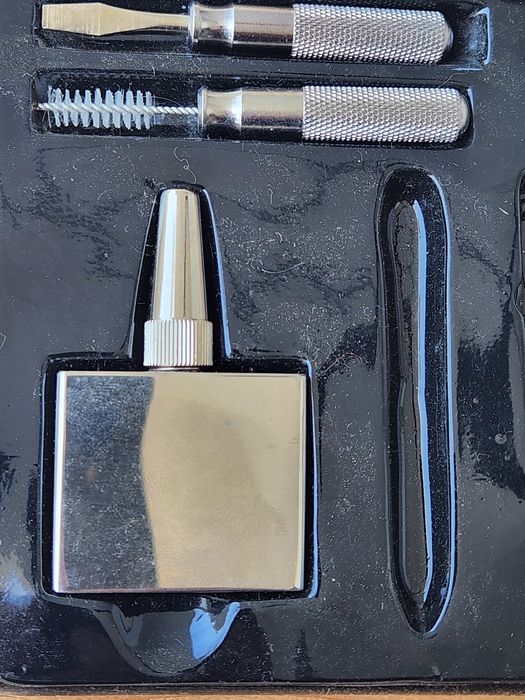 ISQUEIRO U.S com deposito de gasolina ,escovilhão e chave de fendas