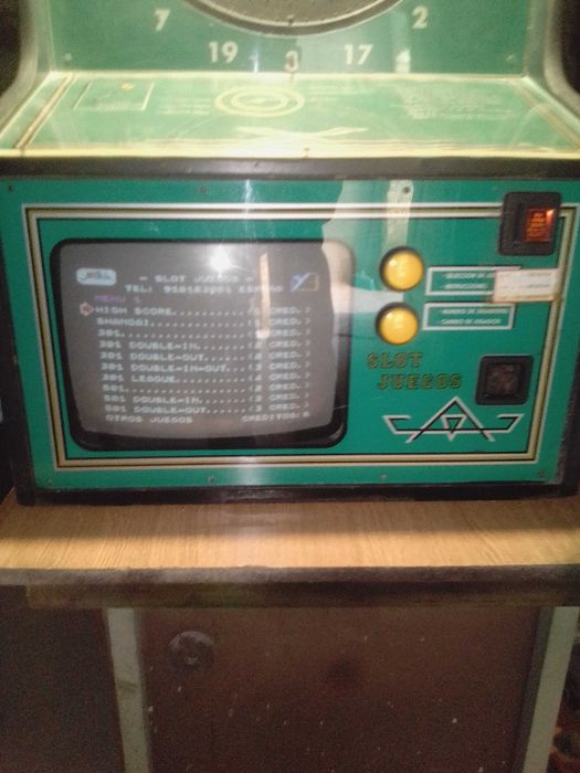 Máquina de setas acionada por moeda usada, Dardomania