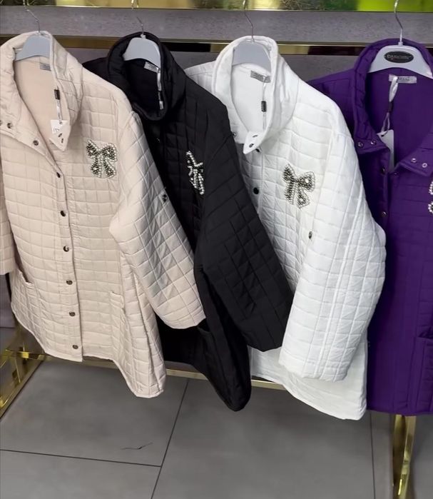 Чорна куртка фірми "Муна" великого розміру