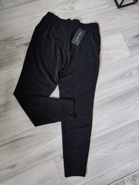 Nowe spodnie srebrna nitka 36/38