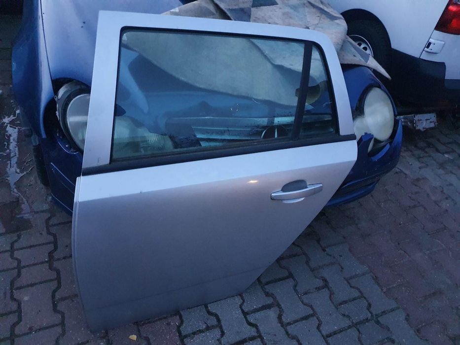 Drzwi lewy tył opel astra iii h kombi srebrne