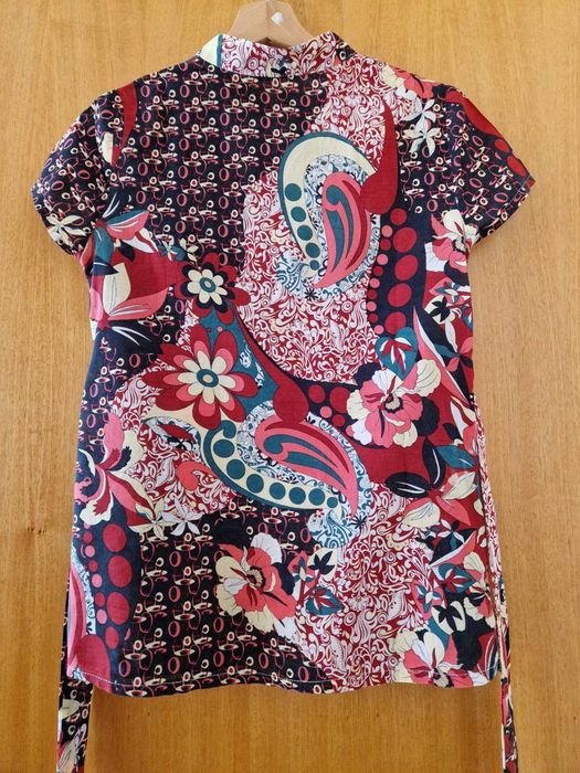 Túnica de manga curta