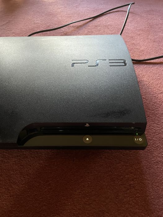 Vendo PS3 Slim + comandos + jogos