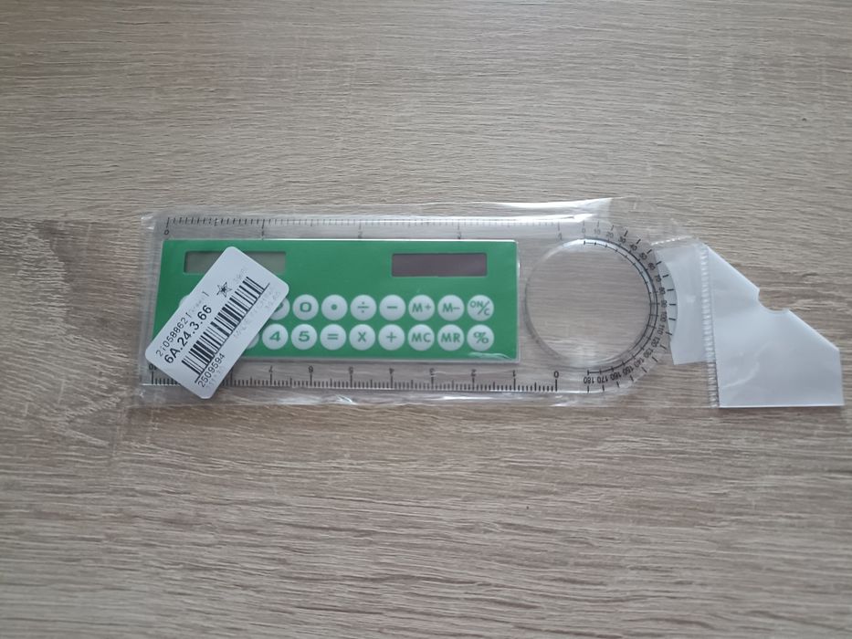 Mini kalkulator słoneczny z przezroczystą linijką i lupą, zielony