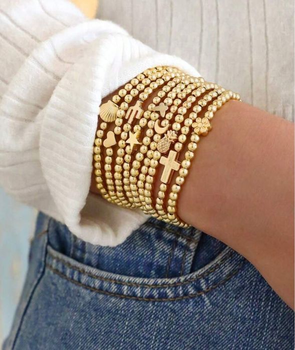 Conjunto de 9 pulseiras tom dourado