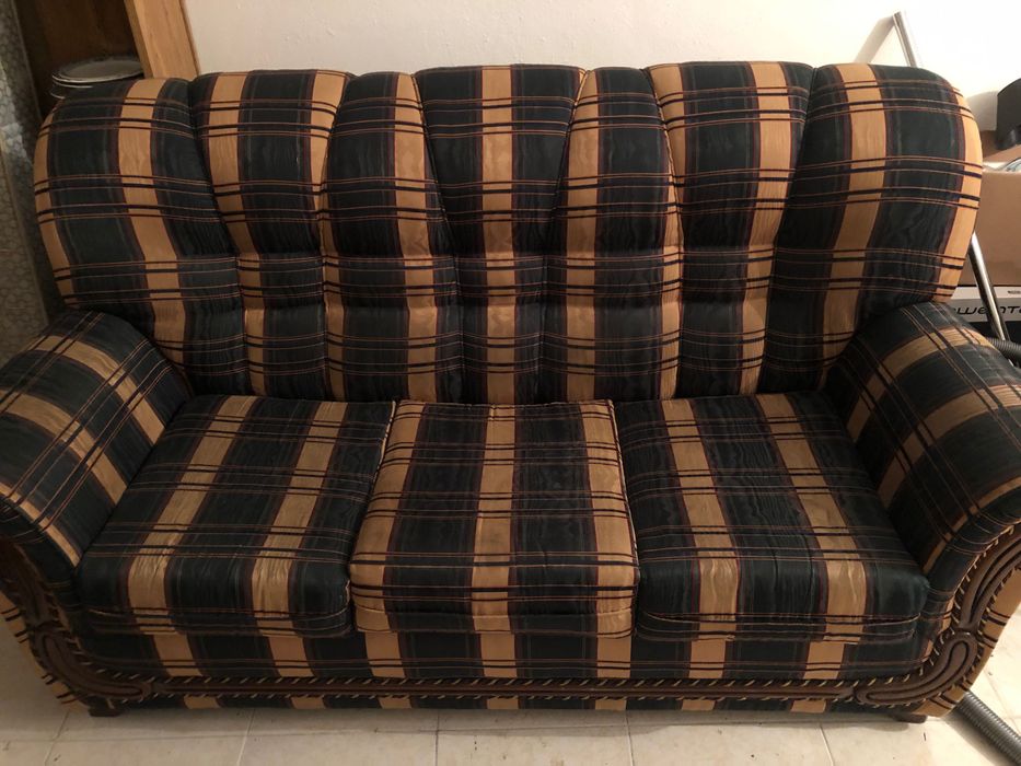 Sofá cama com três lugares