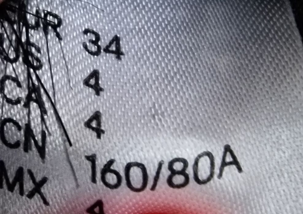 Czarne sztuczne futerko " H&M".