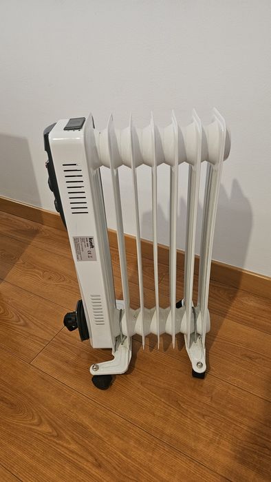 Aquecedor a Óleo KUNFT 1500w (muito novo)