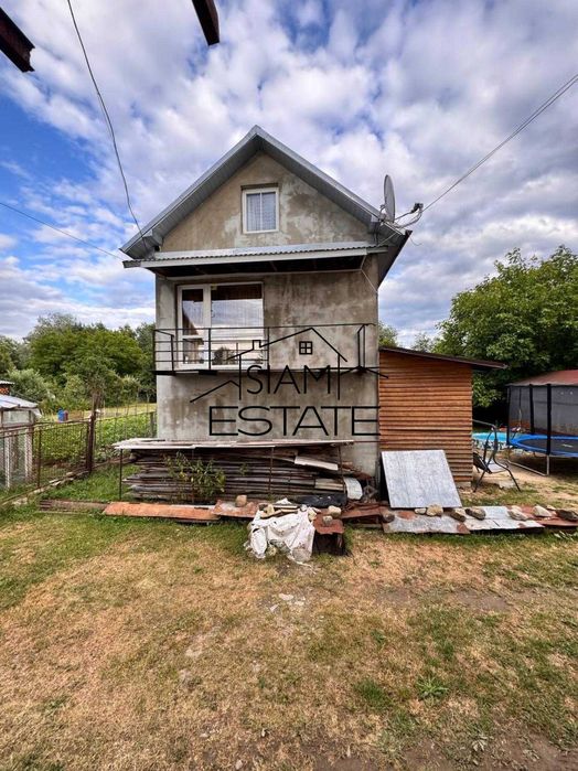 Продається малий житловий будинок з новим недобудованим будинком