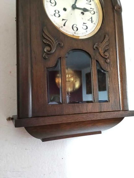 Stary zegar wiszący typu baba.