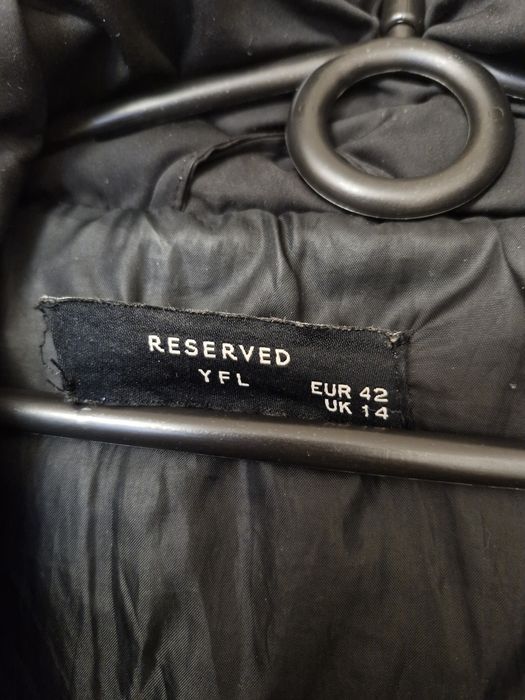 Довге, стьобане дуте пальто .