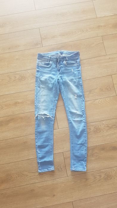 Dżinsy spodnie jeansy zara S z dziurami