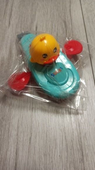 Детская игрушка для ванной механическая утка
