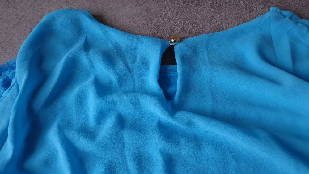 Бірюзова   блузка