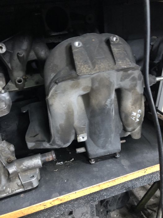 Впускний Випускний колектор шевроле лачеті1.6/1.8