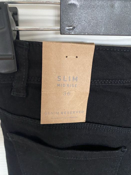 Spodnie jeansy Reserved