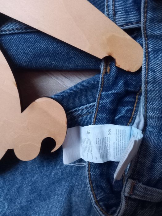 ASpodnie jeans Denim Sinsay roz 42 XL z rozdarciami