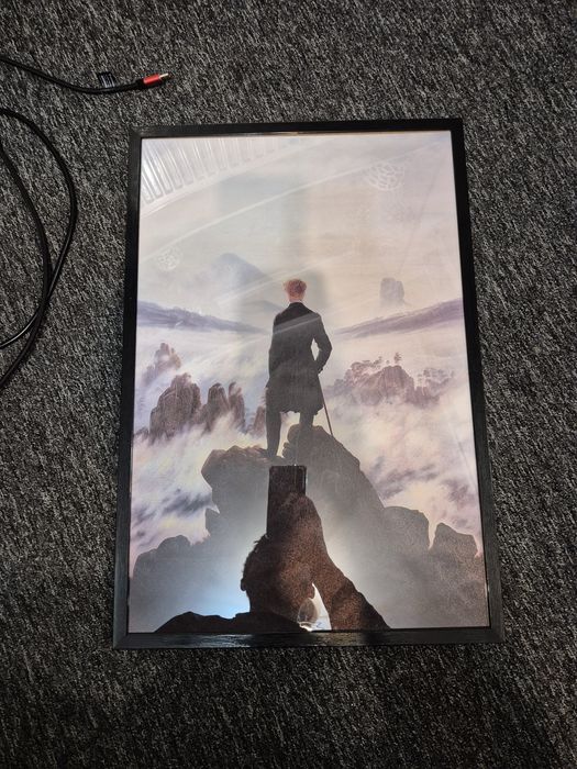 Plakat wędrowiec nad morzem mgły w ramie