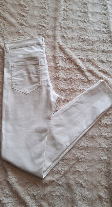 Białe spodnie skinny jeans H&M rozmiar 36