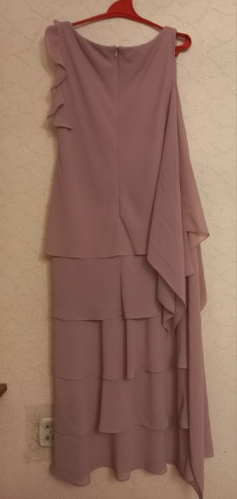 Елегантне світло- сірєнєве жіноче плаття.