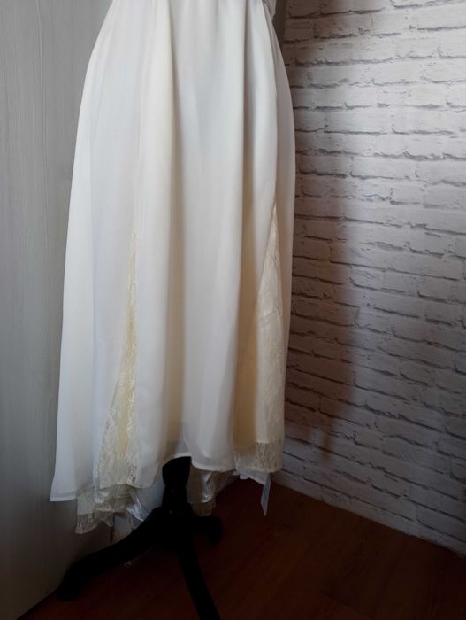 Piękna romantyczna sukienka ślubna 38