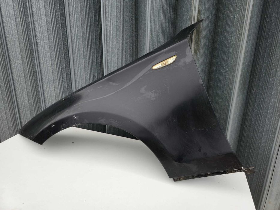 Guarda lamas esquerdo BMW Serie 1 E81 E82 E87 (2003.-2013.)