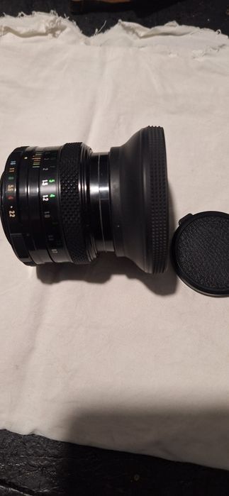 Objetiva máquina fotográfica