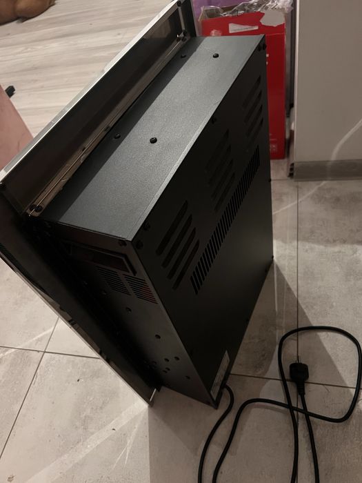 Kominek elektryczny z funkcją grzania