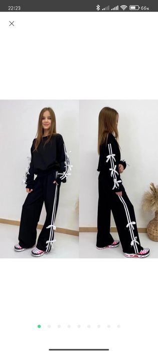 Срочно продам детский костюм с бантиками