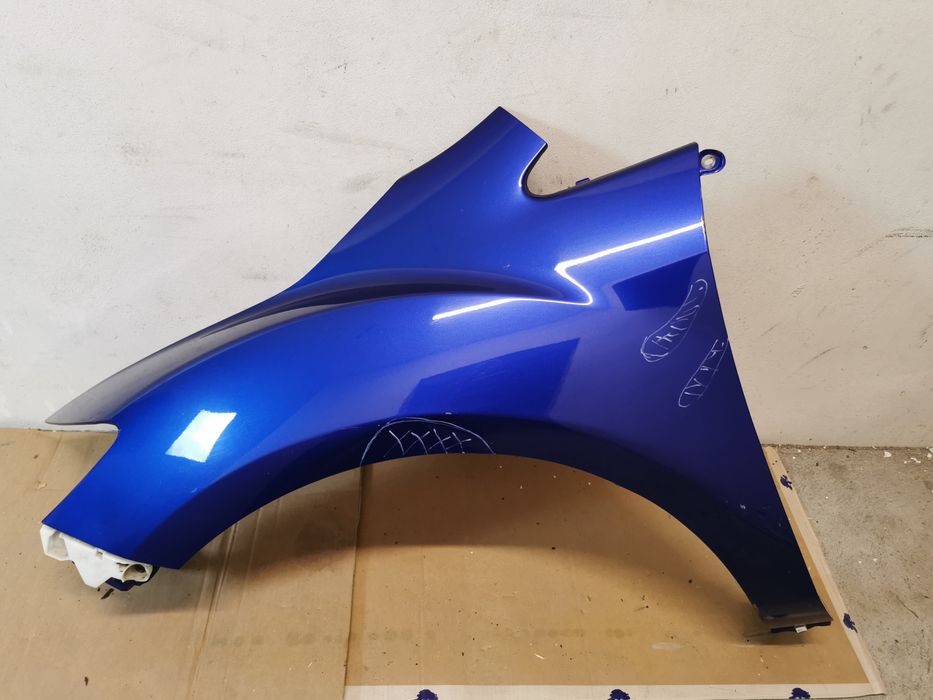 Błotnik Lewy Przód Mazda Cx7 06-12r