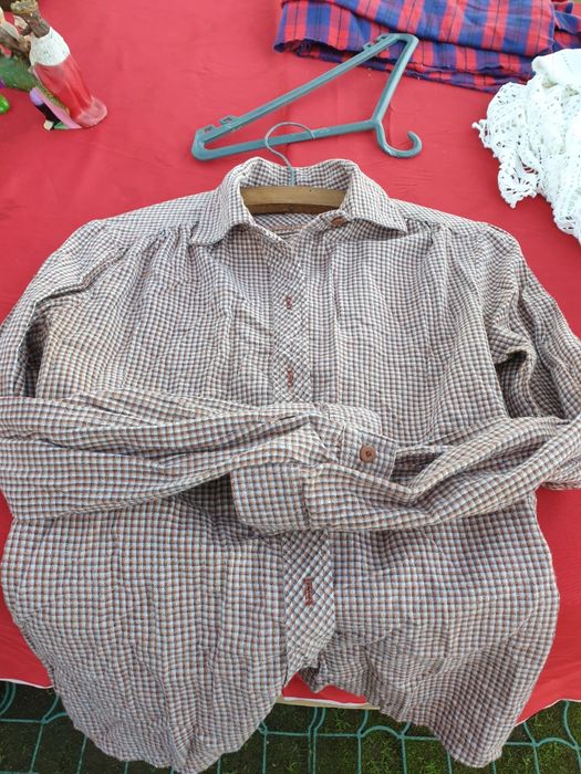 Antiga camisa de criança
