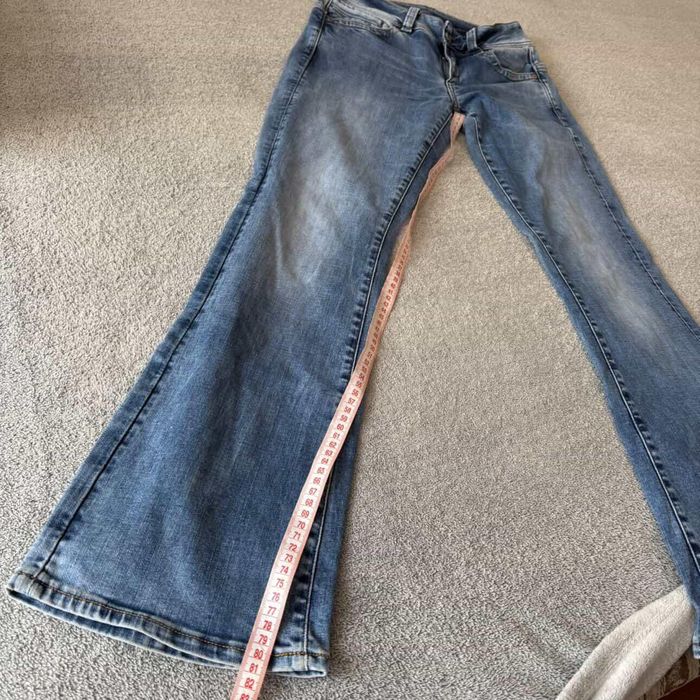 джинси кльош на низькій посадці