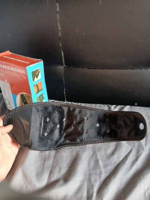 Massageador de mão vibratório com aquecimento