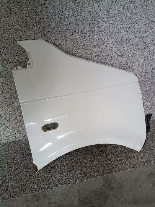 Błotnik prawy VW transporter T5 brak kodu lakieru
