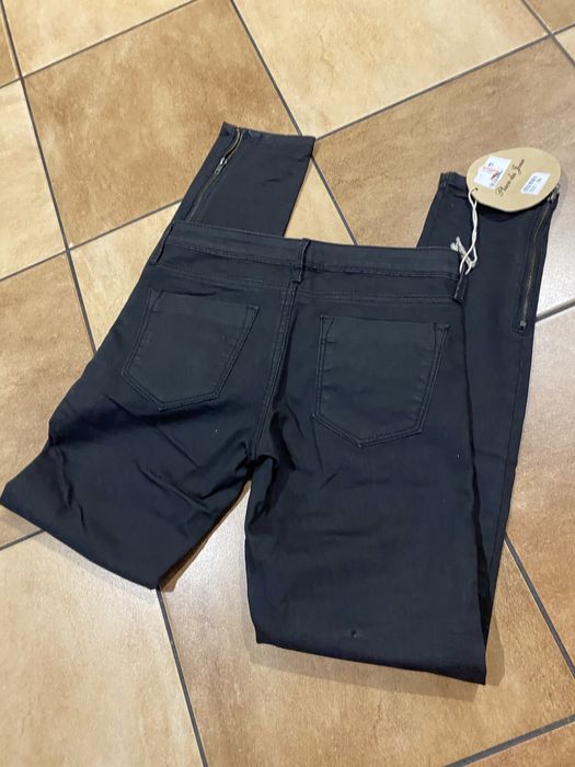 Spodnie skiny z zamkami na nogawkach